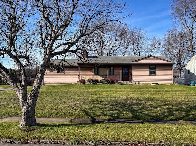 view of front of home featuring a front lawn