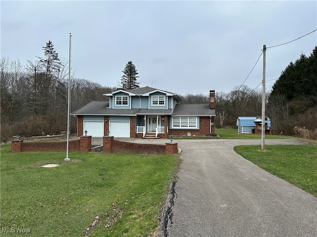 front facade featuring a front lawn