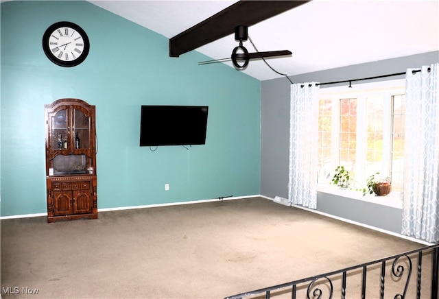 unfurnished living room featuring carpet flooring, lofted ceiling with beams, and ceiling fan