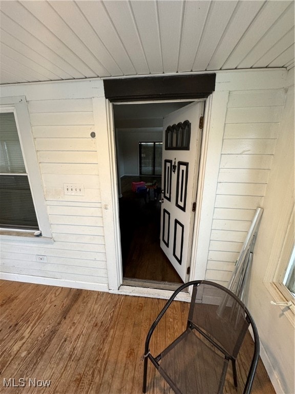 entrance to property with a wooden deck