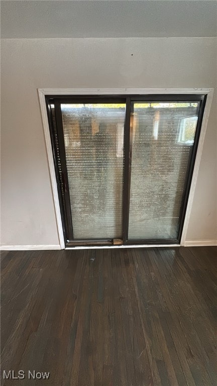 doorway featuring hardwood / wood-style floors