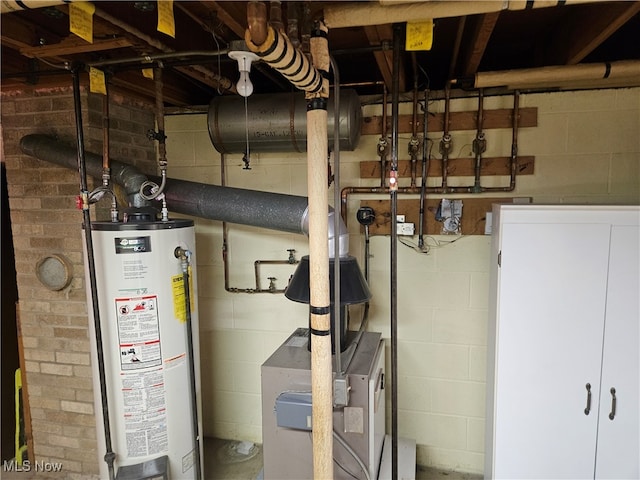 utility room featuring gas water heater