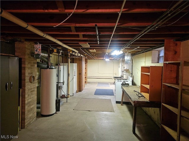 basement with white fridge and water heater