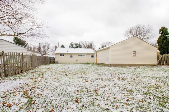 view of snow covered property