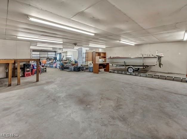 garage with a workshop area