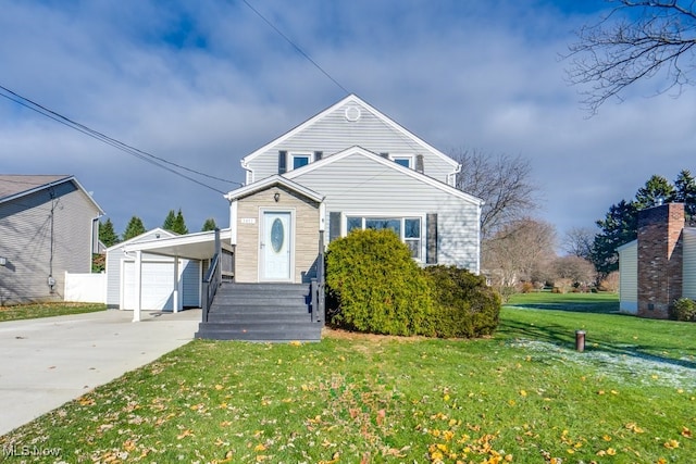 view of front facade featuring a garage, an outdoor structure, and a front lawn