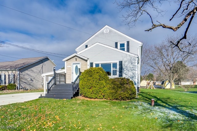 view of front of home with a front yard