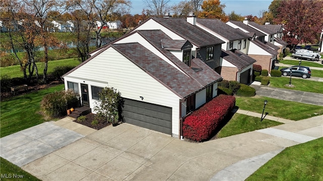 view of side of property featuring a yard