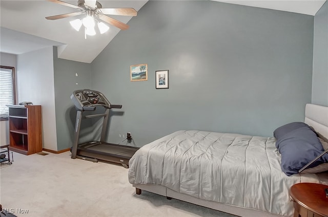 bedroom featuring carpet floors, vaulted ceiling, and ceiling fan