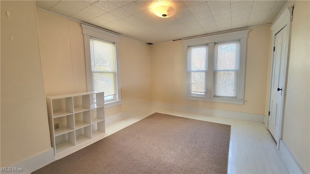 spare room featuring plenty of natural light