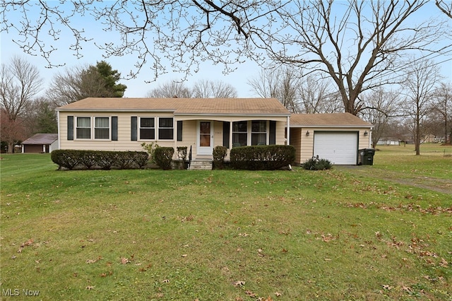 single story home with a porch, a front yard, and a garage