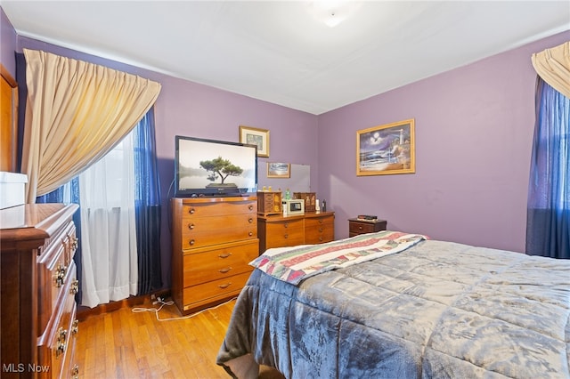 bedroom featuring light hardwood / wood-style floors