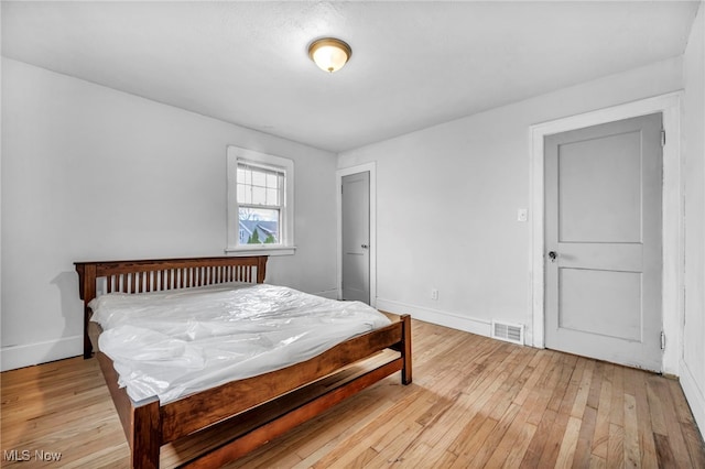 bedroom featuring light wood-type flooring