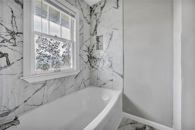 bathroom featuring a bathtub