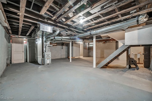 basement featuring heating unit