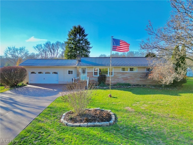 ranch-style house with a garage and a front yard