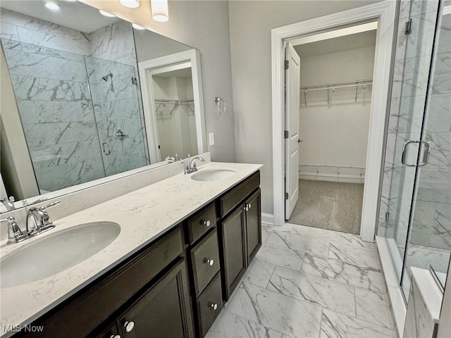 bathroom with vanity and an enclosed shower