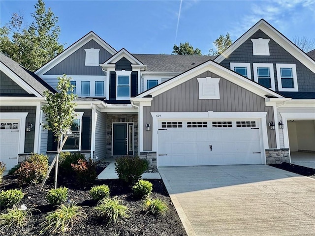 craftsman-style home with a garage