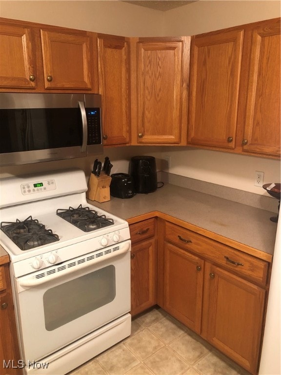 kitchen featuring gas range gas stove