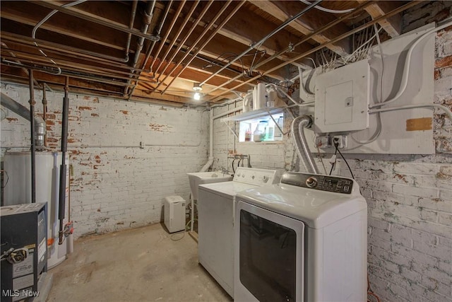 laundry area with washer and clothes dryer, sink, and electric panel