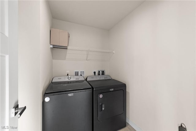 laundry area featuring separate washer and dryer