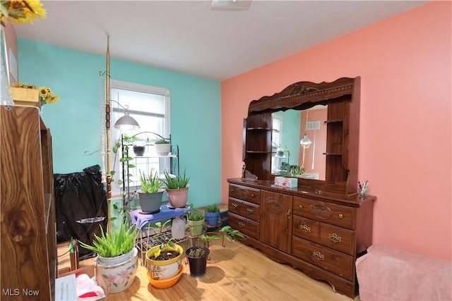 sitting room featuring light wood-type flooring