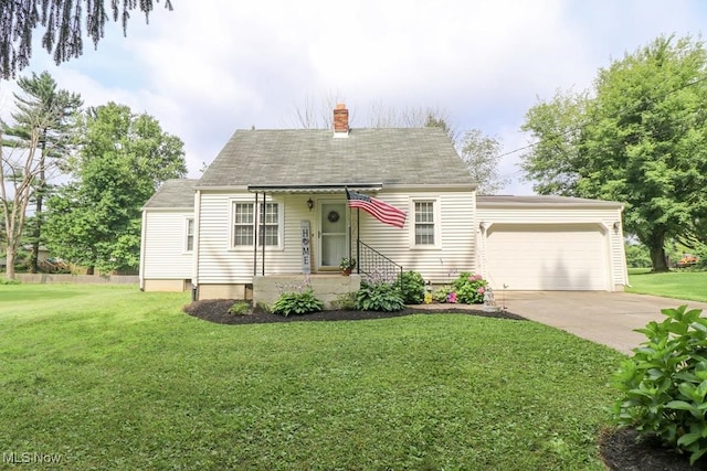 view of front facade featuring a front yard and a garage