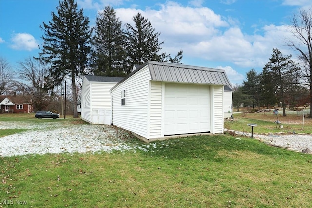 garage with a yard