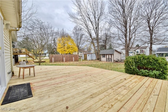 deck featuring a shed