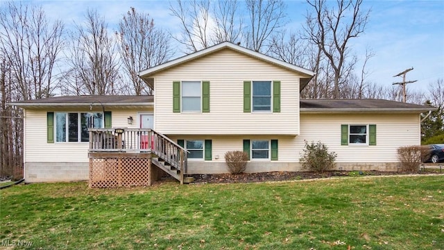 rear view of property with a lawn