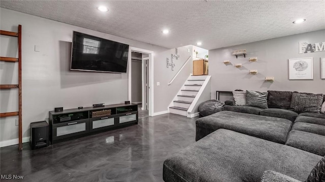 living room with a textured ceiling