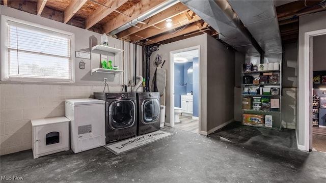 washroom featuring independent washer and dryer