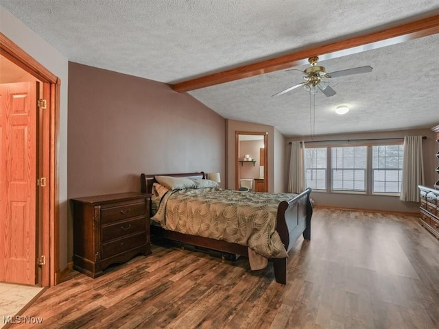 bedroom featuring a textured ceiling, hardwood / wood-style flooring, and ceiling fan