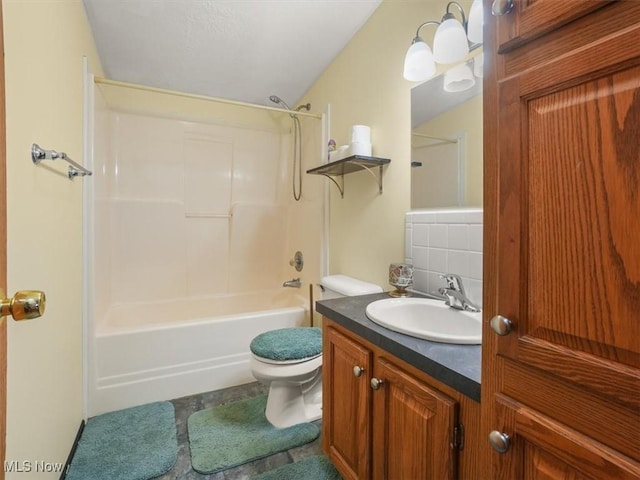 full bathroom with decorative backsplash, vanity, bathing tub / shower combination, and toilet