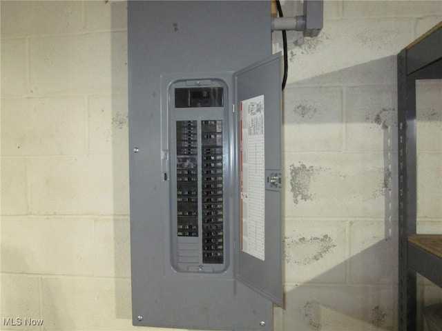 utility room featuring electric panel