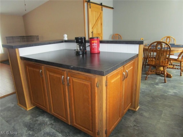 kitchen featuring a barn door