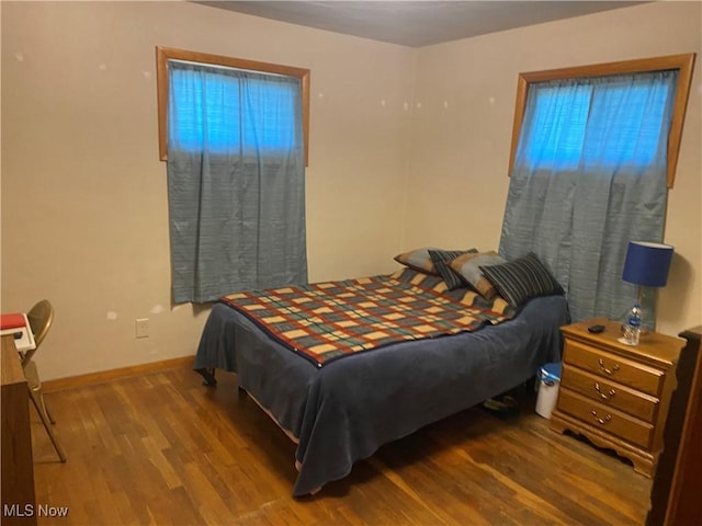 bedroom featuring wood-type flooring