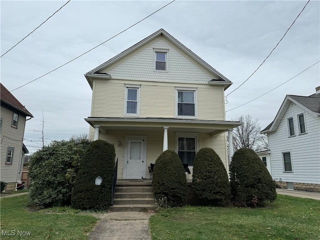 view of front facade featuring a front lawn