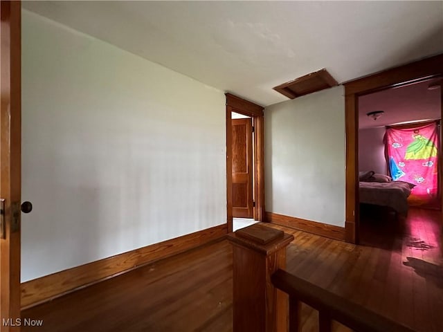 hall featuring wood-type flooring