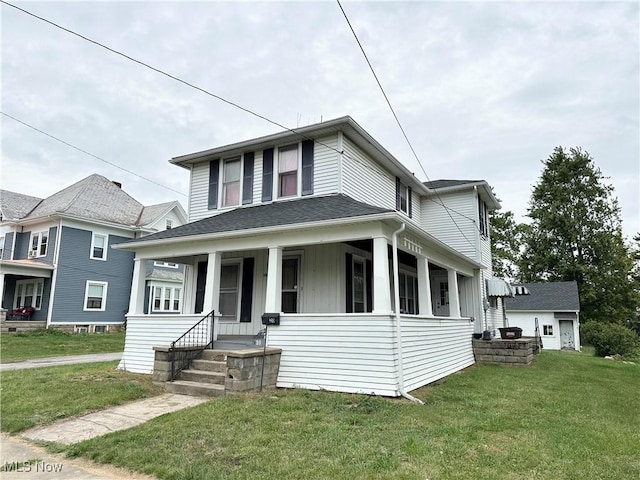 view of front facade featuring covered porch and a front yard