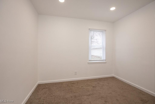 view of carpeted spare room