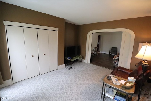 interior space featuring hardwood / wood-style floors and a closet