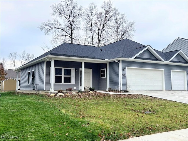 ranch-style home featuring a garage and a front yard