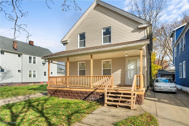 view of front of property featuring covered porch