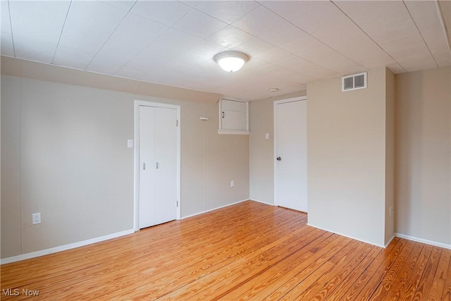 empty room featuring light hardwood / wood-style floors