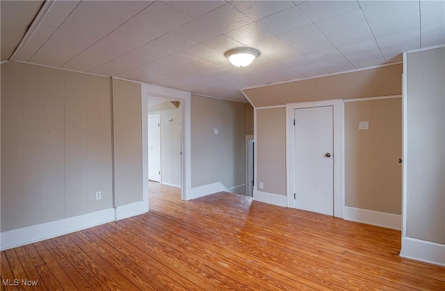 unfurnished room featuring light hardwood / wood-style floors