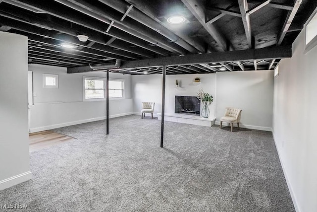 basement with carpet flooring