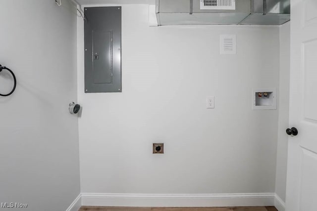 washroom with hookup for an electric dryer, washer hookup, and electric panel