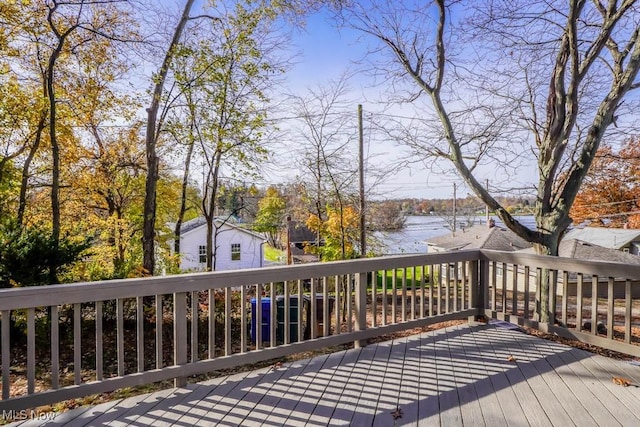 deck featuring a water view