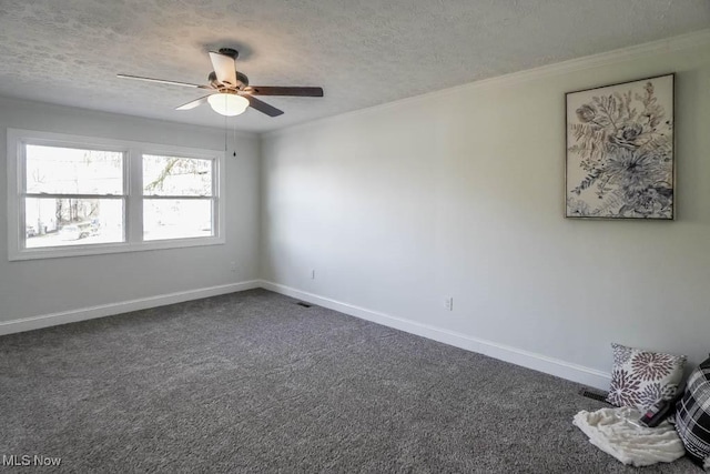 carpeted empty room with a textured ceiling and ceiling fan